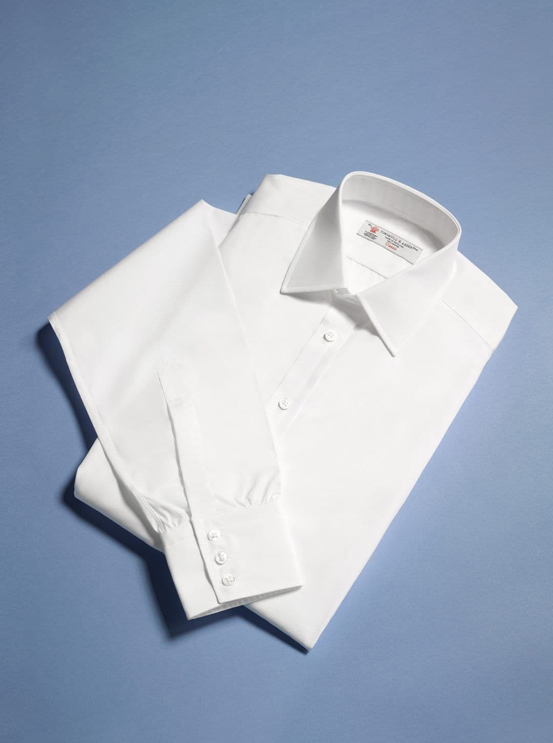 The iconic white shirt